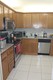 Commodore plaza condo Unit 104, condo for sale in Aventura